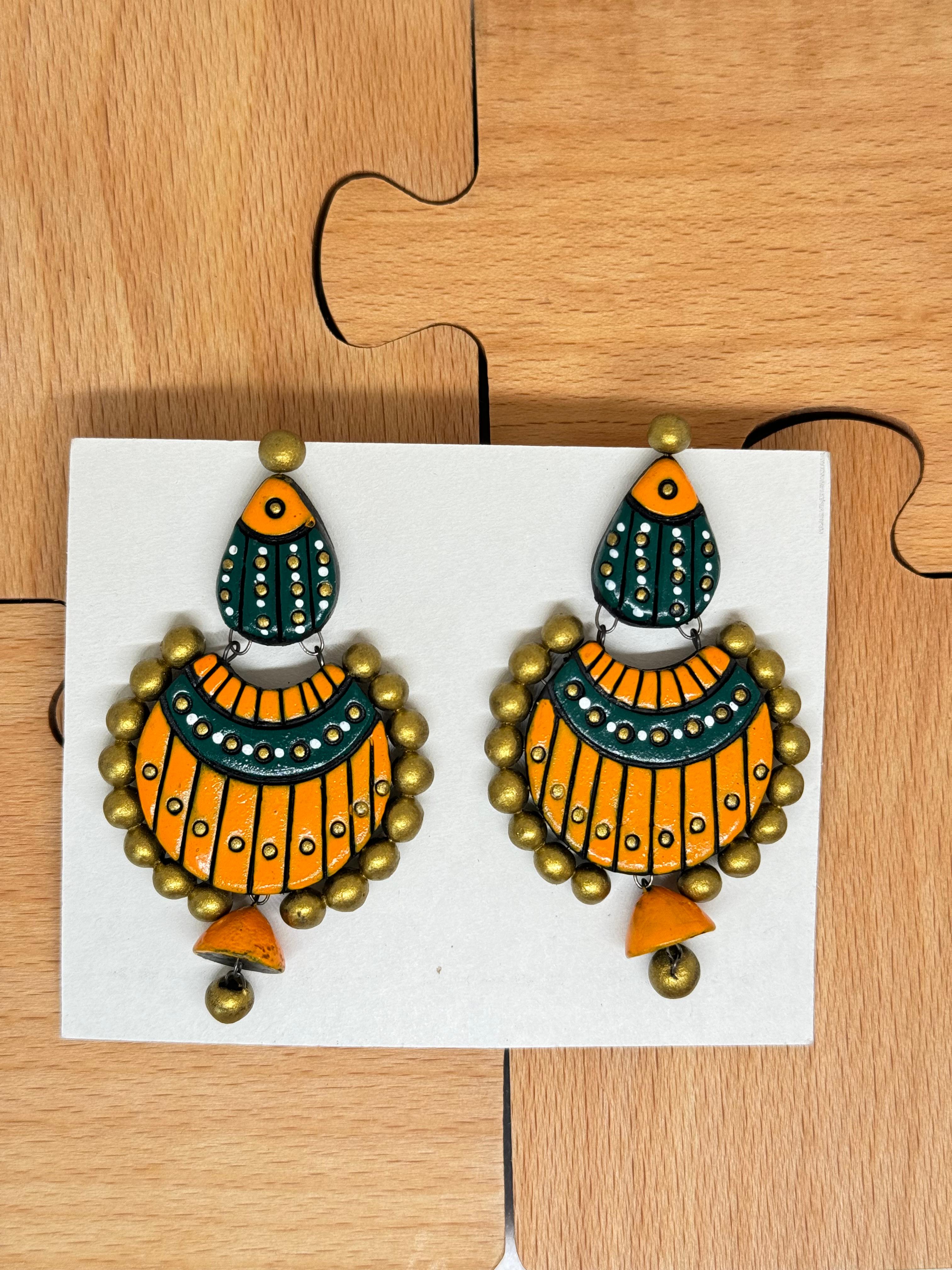 Antique Fusion earrings covered with blue orange and gold colors