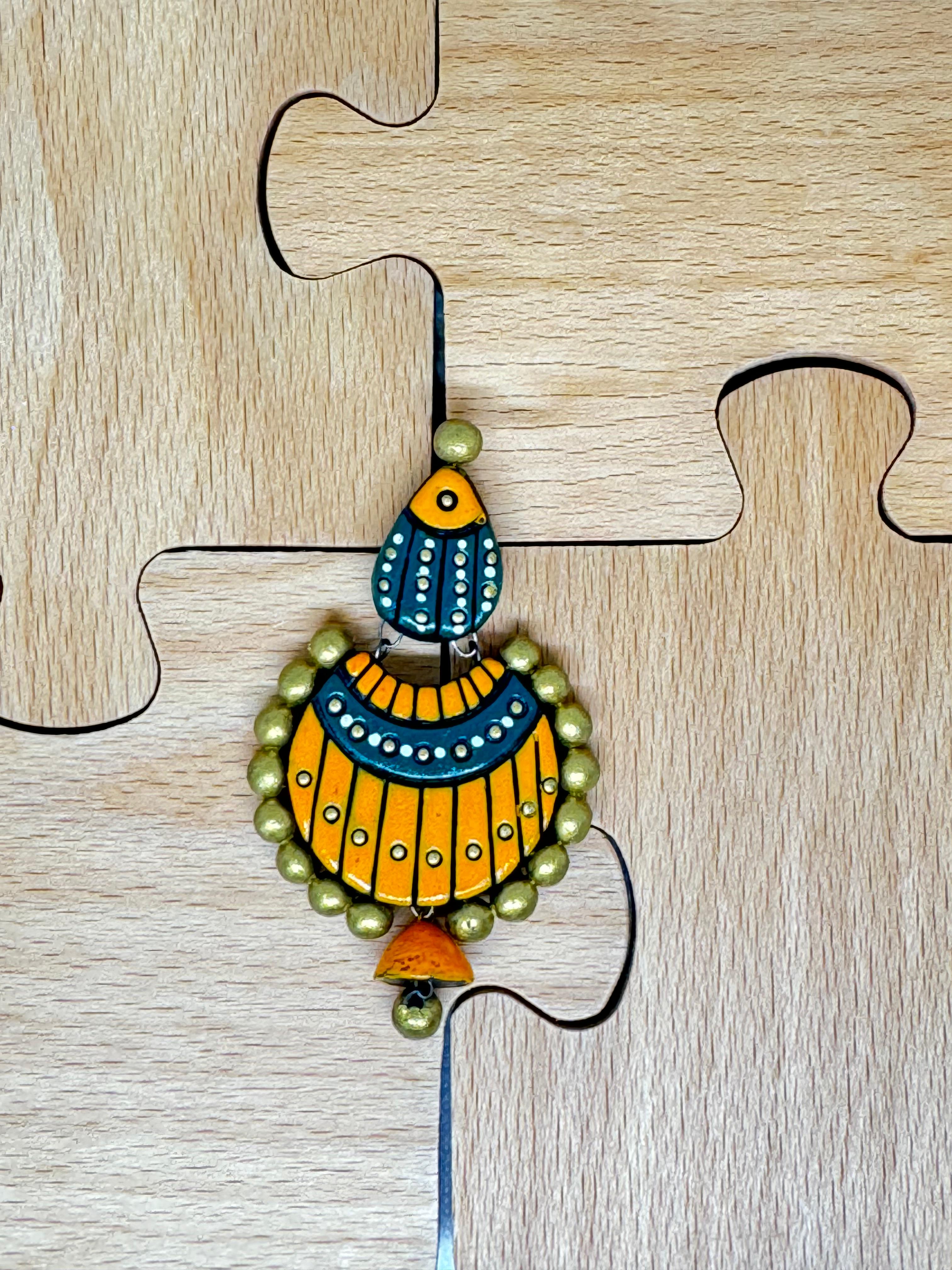 Antique Fusion earrings covered with blue orange and gold colors