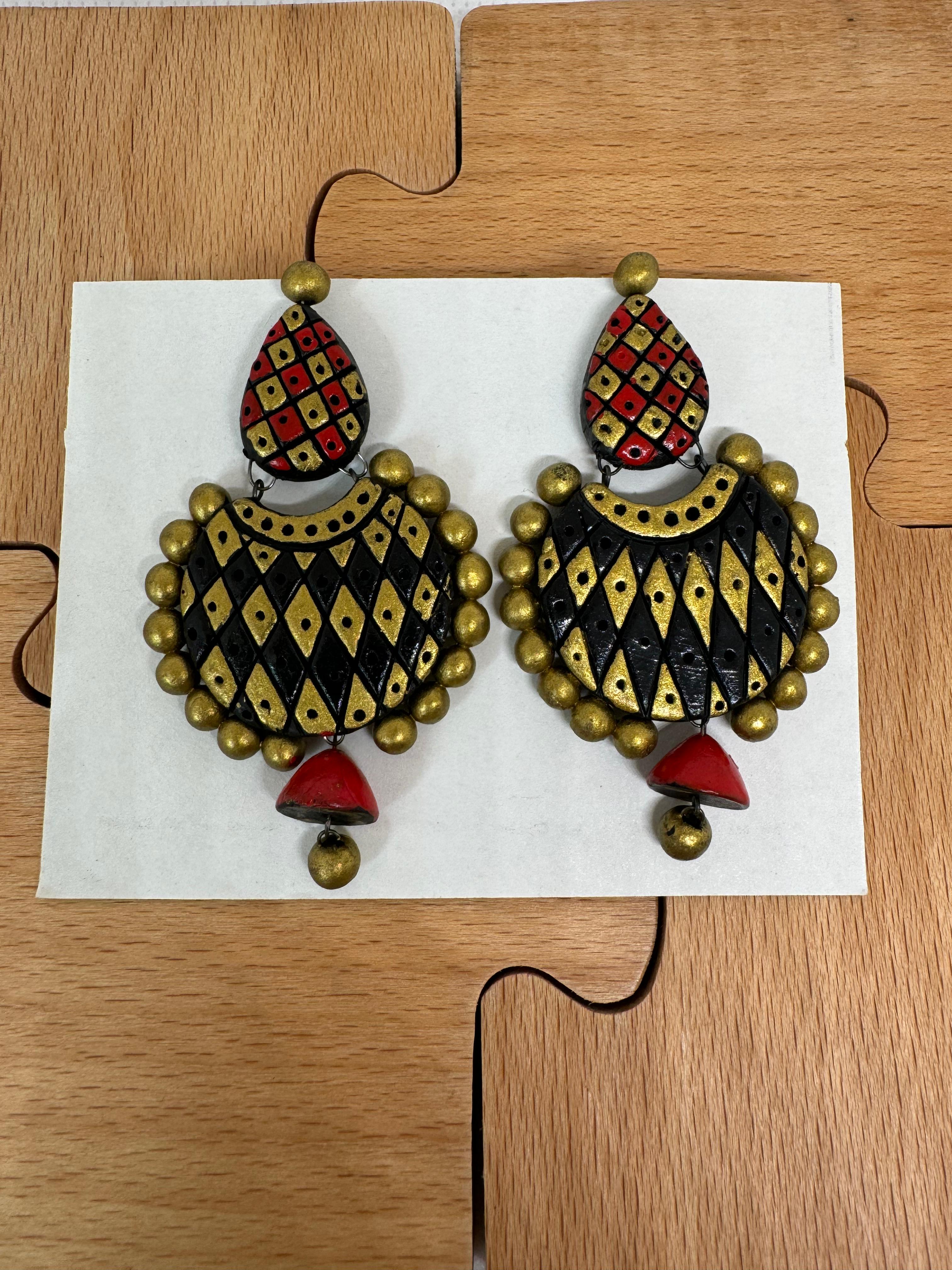 Antique Fusion Earrings covered with gold brown and red colors