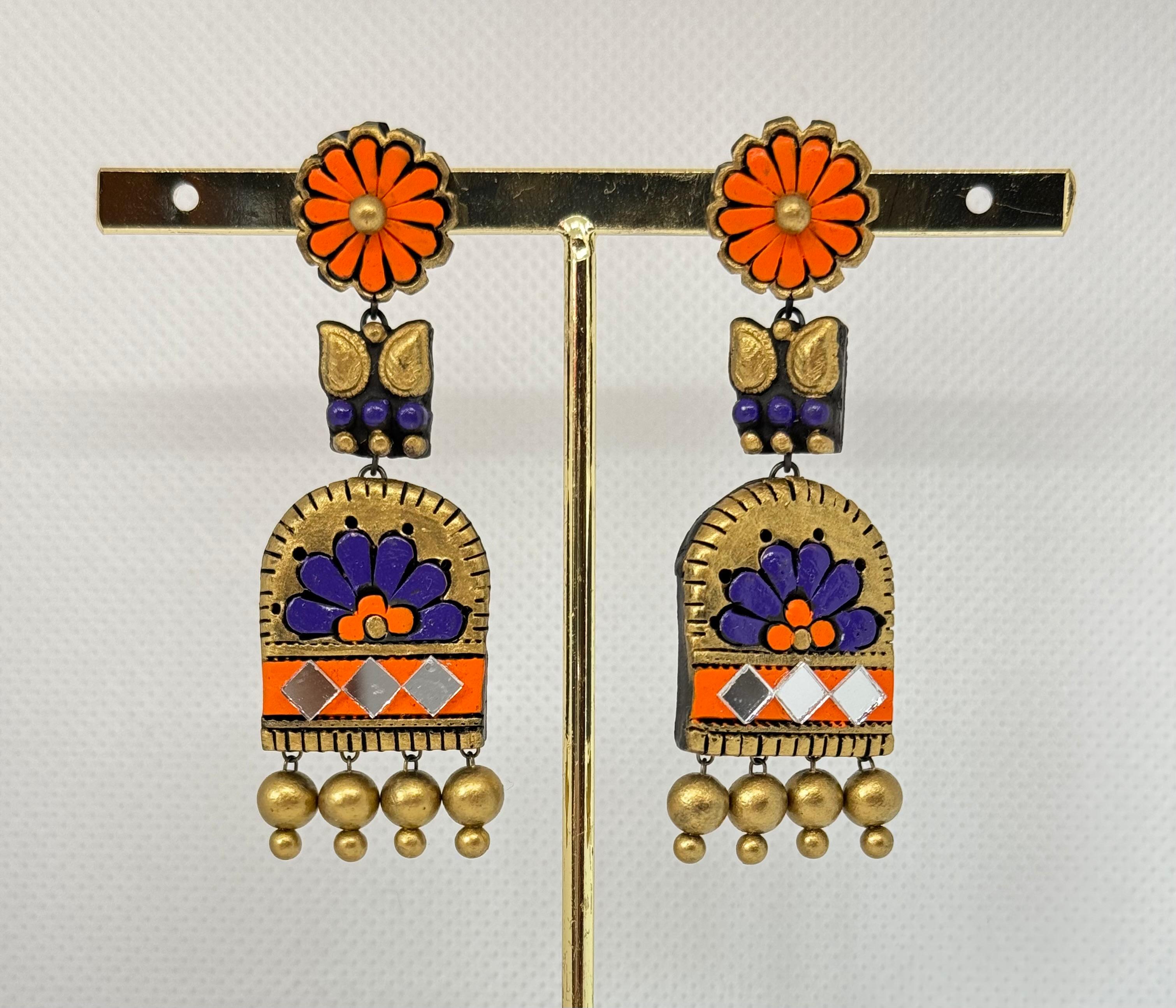 Antique Fusion Jhumka with different shape and covered with gold, orange and blue color