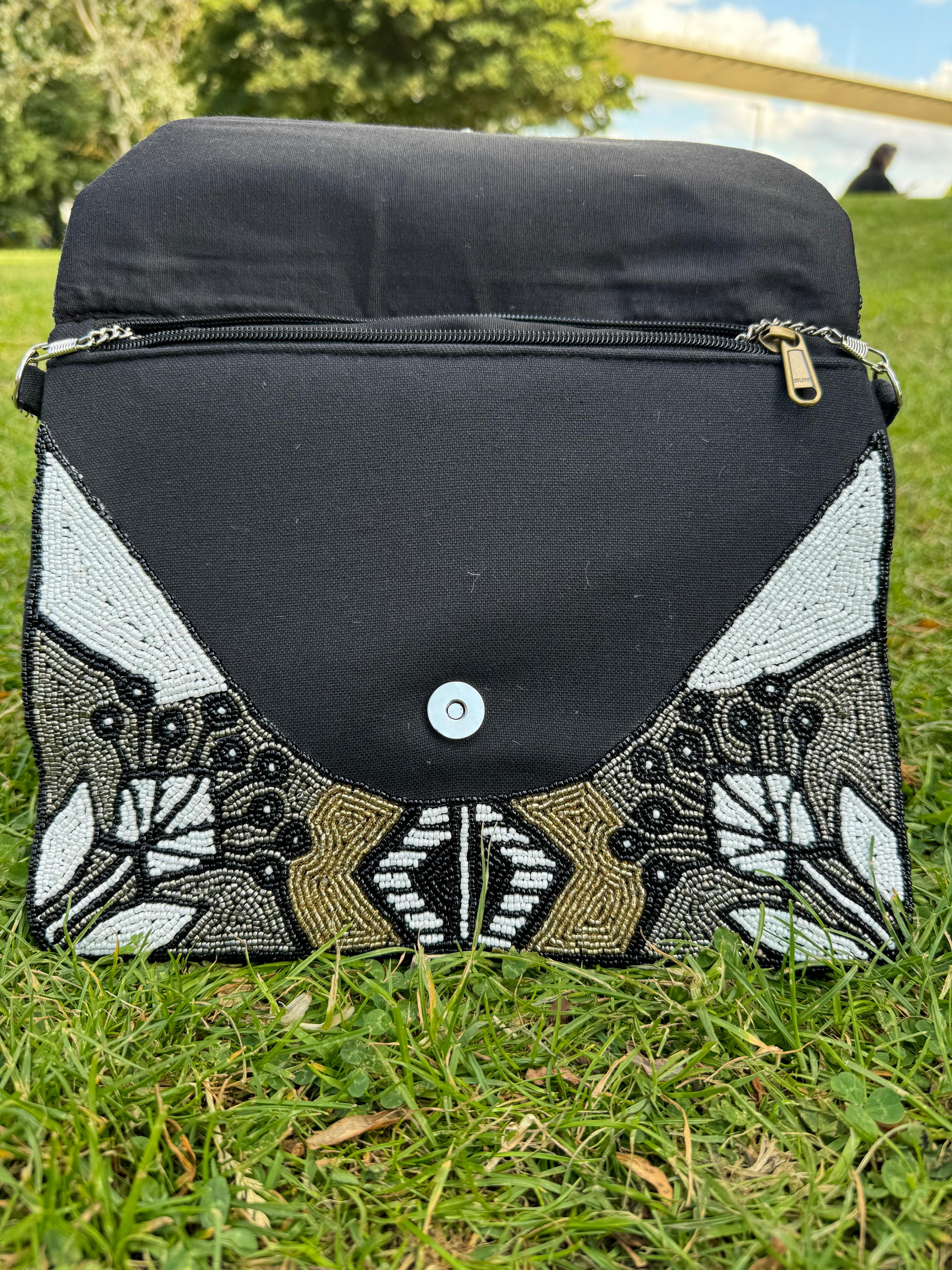 Handbag with black beauty design